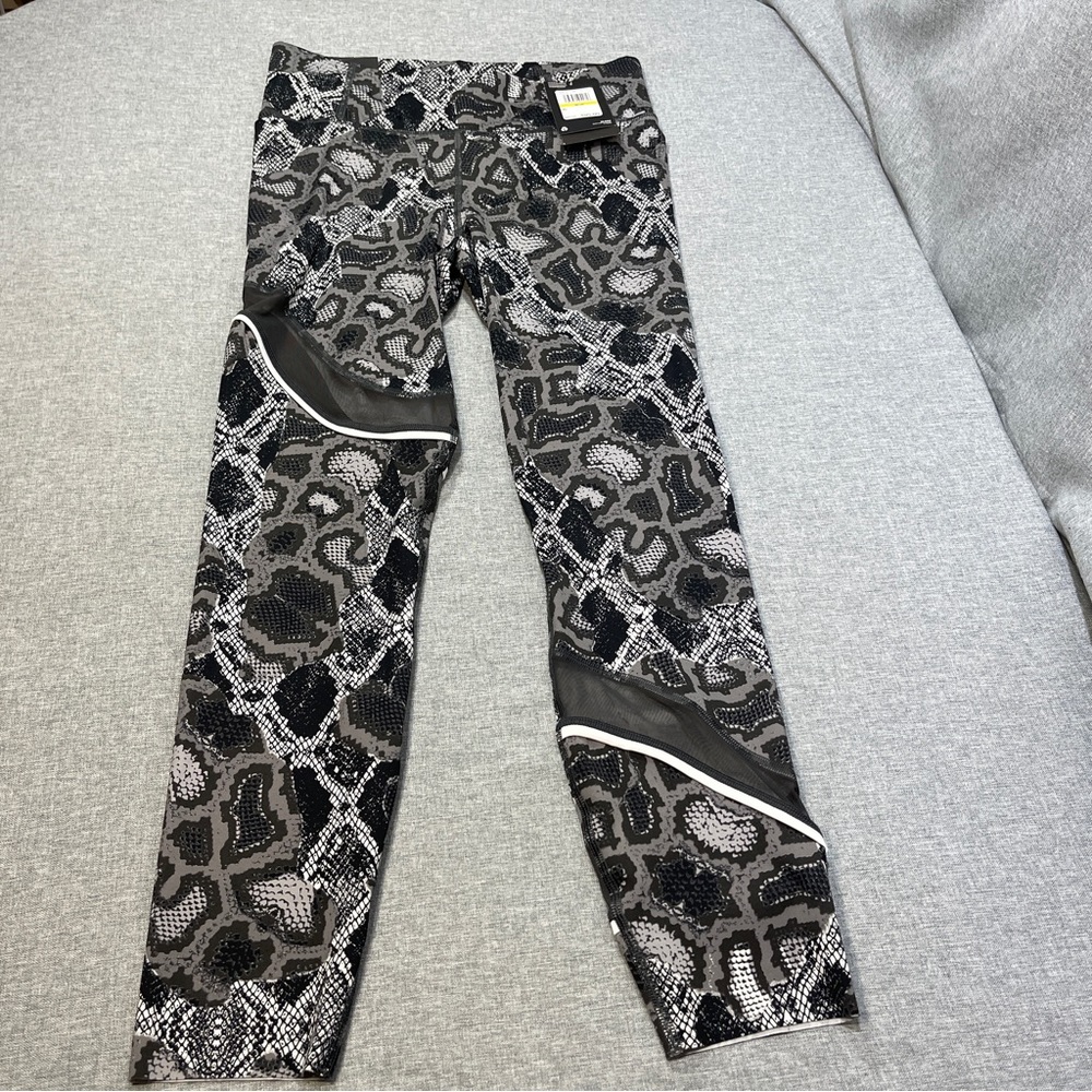 Under Armour Pants Women's Speedpocket Running leggings SZ MEDIUM